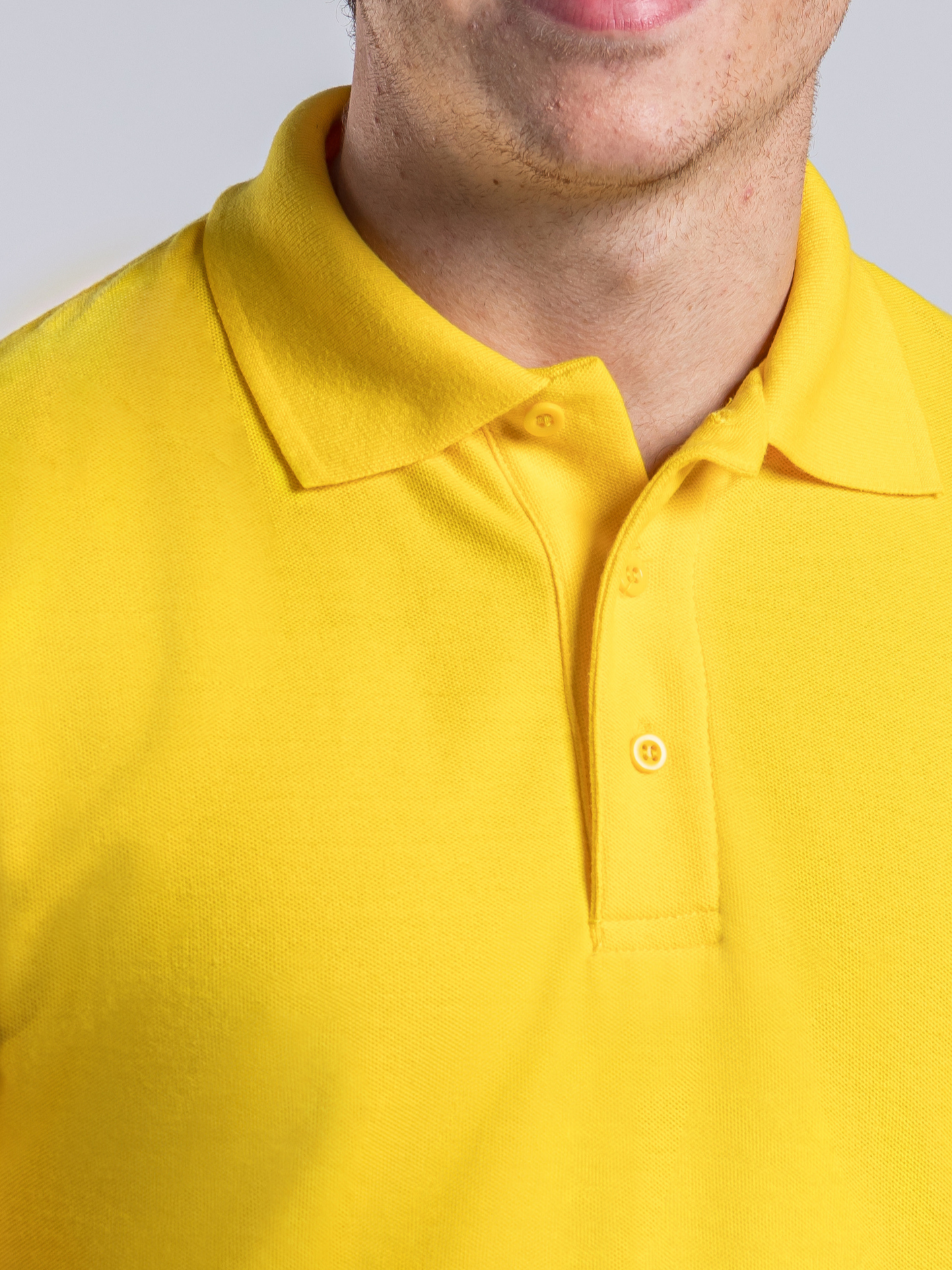 Yellow polo shirt with ribbed collar