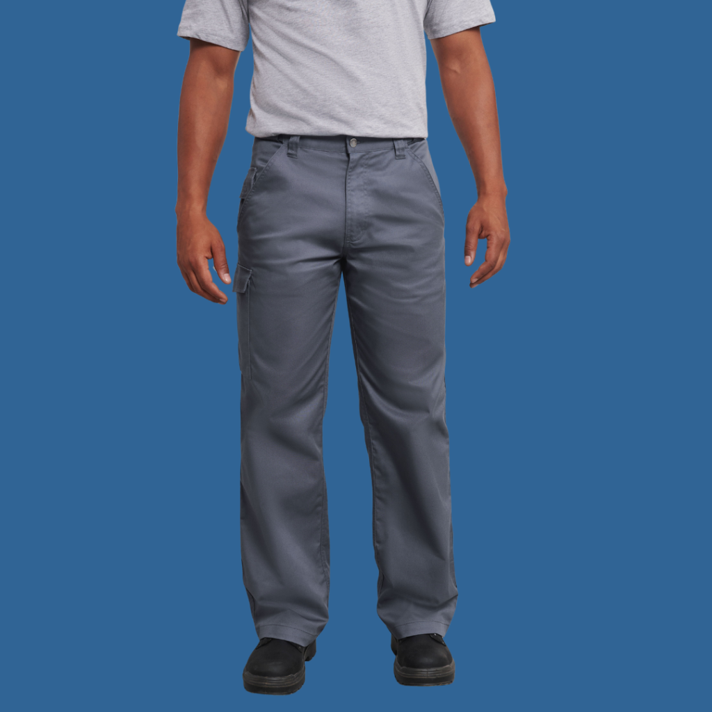 Mens grey workwear trousers on a model with a blue background.